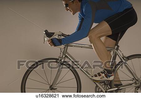 Man cycling View Large Photo Image Stock Image - Man cycling. Fotosearch