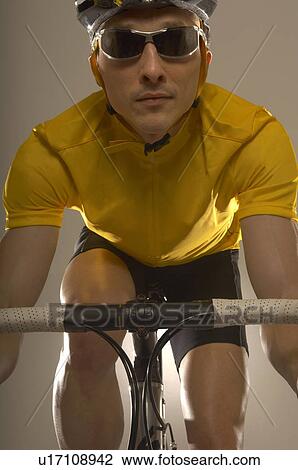 Stock Image - Man cycling. Fotosearch