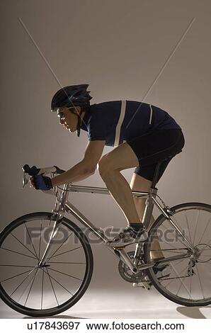 Stock Photo - Man cycling. Fotosearch