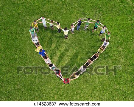 Group in heart shape formation View Large Photo Image Stock Photo - Group in heart shape formation. Fotosearch