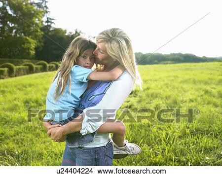 Mother and daughter portrait. View Large Photo Image Picture - Mother and daughter portrait.. Fotosearch