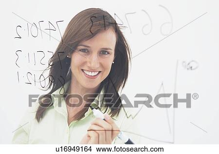Happy woman holding pen behind glass View Large Photo Image Picture - Happy woman holding pen behind glass. Fotosearch
