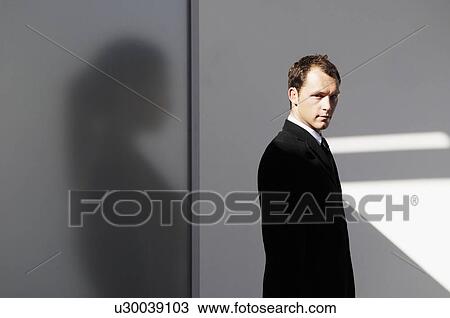 Man looking, woman behind screen View Large Photo Image Stock Image - Man looking, woman behind screen. Fotosearch