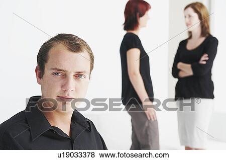 Portrait of male, figures in background View Large Photo Image Stock Photo - Portrait of male, figures in background. Fotosearch