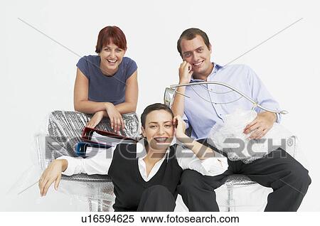 Three people moving into new office View Large Photo Image Stock Photography - Three people moving into new office. Fotosearch