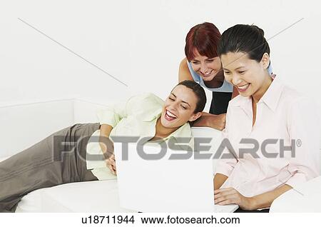 Three woman laughing View Large Photo Image Picture - Three woman laughing. Fotosearch