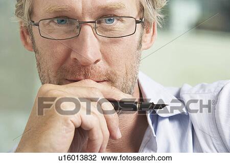 Close-Up portrait of Businessman. View Large Photo Image Stock Image - Close-Up portrait of Businessman.. Fotosearch