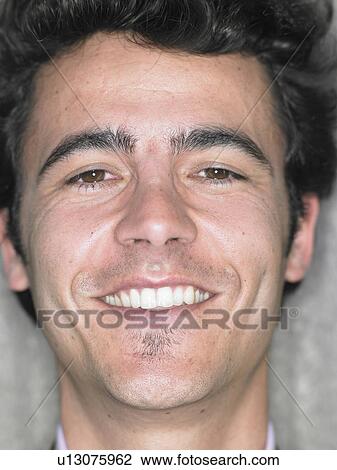 Close up portrait of young man smiling, Alicante, Spain, View Large Photo Image Stock Image - Close up portrait of young man smiling, Alicante, Spain,. Fotosearch