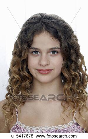 Girl (9-11) smiling, portrait View Large Photo Image Stock Photo - Girl (9-11) smiling, portrait. Fotosearch