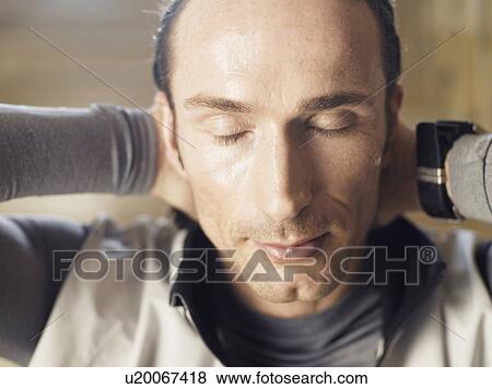 Mature man with hands behind head, close-up, eyes closed View Large Photo Image Stock Photo - Mature man with hands behind head, close-up, eyes closed. Fotosearch