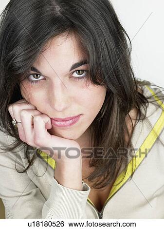 Stock Photograph - Woman resting head on hand.. Fotosearch