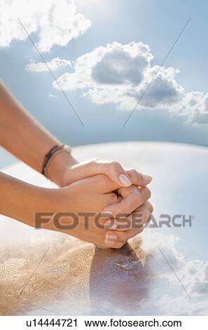 Close-up of hands against a sky. View Large Photo Image Stock Image - Close-up of hands against a sky.. Fotosearch