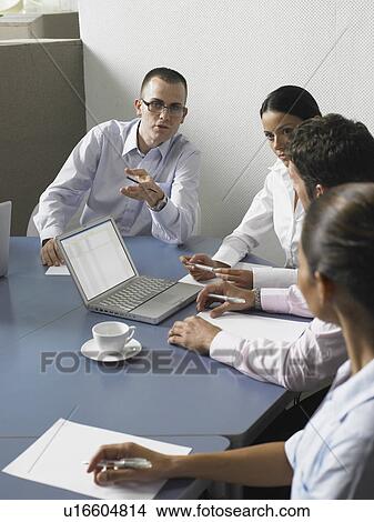 Picture - Businesspeople in a meeting. Fotosearch