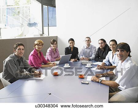 Businesspeople in a meeting View Large Photo Image Picture - Businesspeople in a meeting. Fotosearch