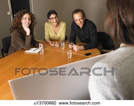 Woman giving presentation in business meeting. Brussels, Belgium. View Large Photo Image Stock Image - Woman giving presentation in business meeting. Brussels, Belgium.. Fotosearch