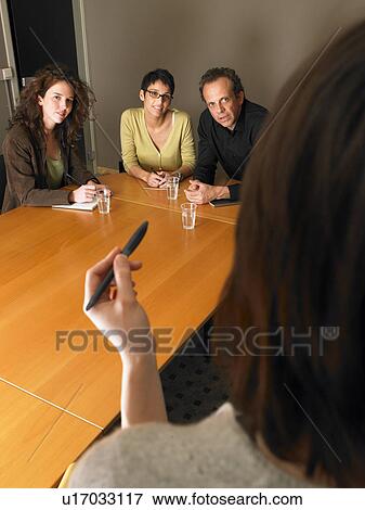 Woman giving presentation in business meeting. Brussels, Belgium. View Large Photo Image Stock Photo - Woman giving presentation in business meeting. Brussels, Belgium.. Fotosearch