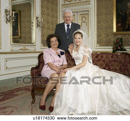 Mother and Father with Bride, smiling, portrait View Large Photo Image Stock Image - Mother and Father with Bride, smiling, portrait. Fotosearch