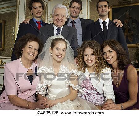 Multigenerational family wedding party smiling, portrait View Large Photo Image Stock Photo - Multigenerational family wedding party smiling, portrait. Fotosearch