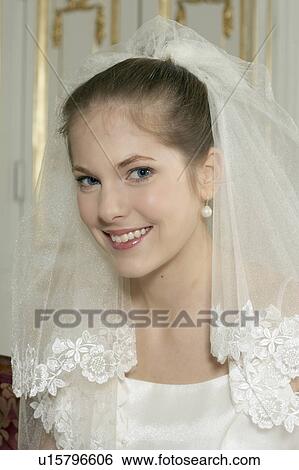 Young bride smiling, portrait View Large Photo Image Stock Photograph - Young bride smiling, portrait. Fotosearch