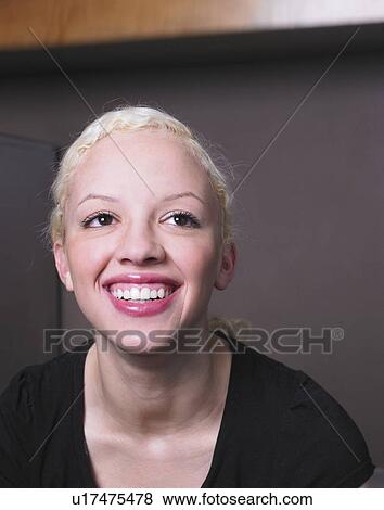 Businesswoman at her desk View Large Photo Image Stock Photo - Businesswoman at her desk. Fotosearch