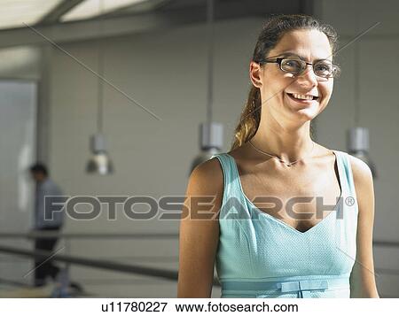 Stock Photo - Businesswoman working in an office. Fotosearch