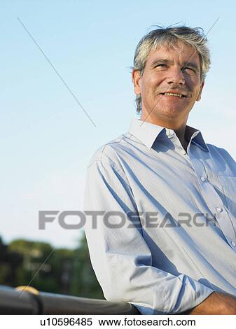 Portrait of mature man View Large Photo Image Stock Photography - Portrait of mature man. Fotosearch