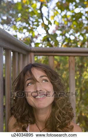 Stock Photography - Portrait of woman smiling.. Fotosearch