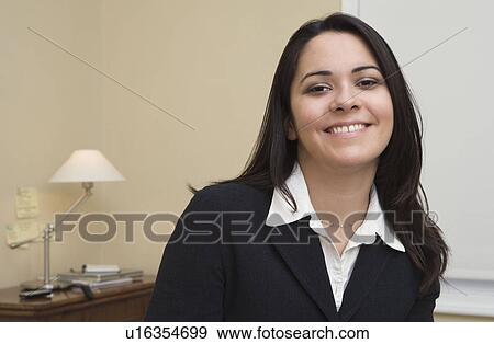 Smiling portrait of working woman View Large Photo Image Stock Photo - Smiling portrait of working woman. Fotosearch