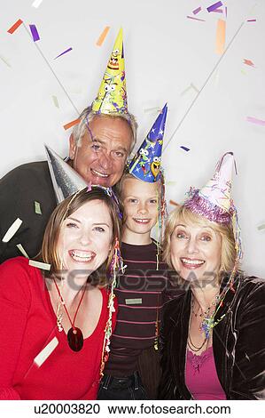 3 generation family in party hats View Large Photo Image Stock Image - 3 generation family in party hats. Fotosearch