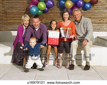 3 generation family with birthday gifts View Large Photo Image Stock Image - 3 generation family with birthday gifts. Fotosearch