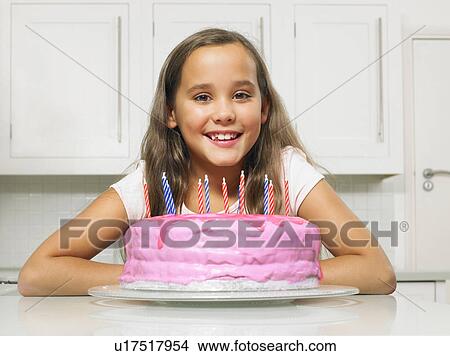 Portrait of girl with birthday cake View Large Photo Image Picture - Portrait of girl with birthday cake. Fotosearch