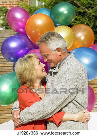 Senior couple hugging View Large Photo Image Stock Photograph - Senior couple hugging. Fotosearch