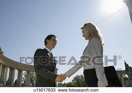 Businesspeople shaking hands. View Large Photo Image Stock Image - Businesspeople shaking hands.. Fotosearch