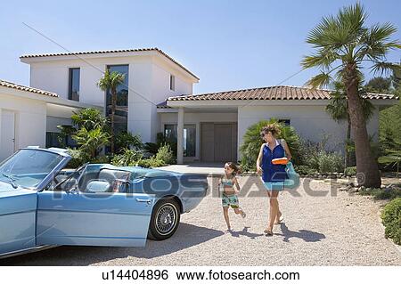 Mother and daughter leaving home. View Large Photo Image Stock Photograph - Mother and daughter leaving home.. Fotosearch