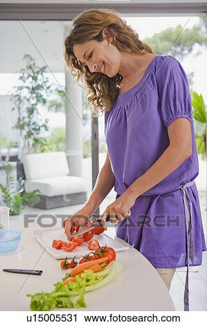 Woman in kitchen. View Large Photo Image Stock Image - Woman in kitchen.. Fotosearch