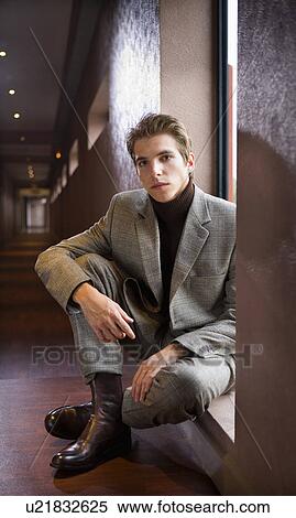 Portrait young businessman sitting. View Large Photo Image Stock Photography - Portrait young businessman sitting.. Fotosearch