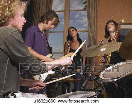Stock Image - Band playing music.. Fotosearch