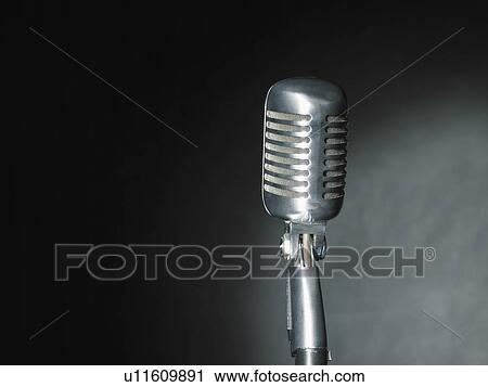 Stock Image - Close up on microphone.. Fotosearch