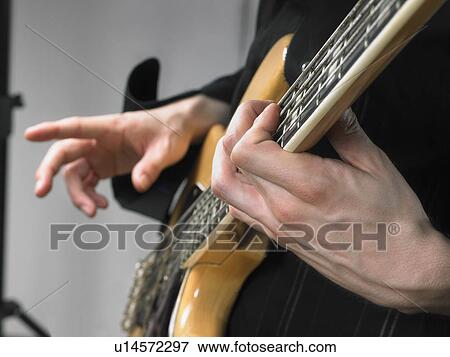 One Electric Guitar Player Close Up On Hands Stock Photo U Fotosearch