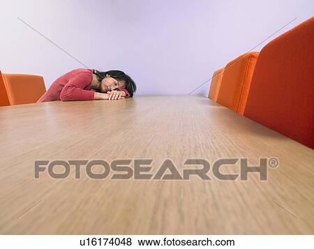 Sleeping businesswoman at meeting table. View Large Photo Image Stock Photo - Sleeping businesswoman at meeting table.. Fotosearch
