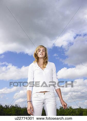 Girl standing still. View Large Photo Image Stock Image - Girl standing still.. Fotosearch