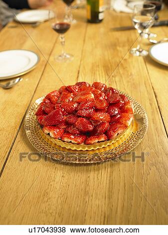 Strawberry tart on dining table View Large Photo Image Stock Photo - Strawberry tart on dining table. Fotosearch