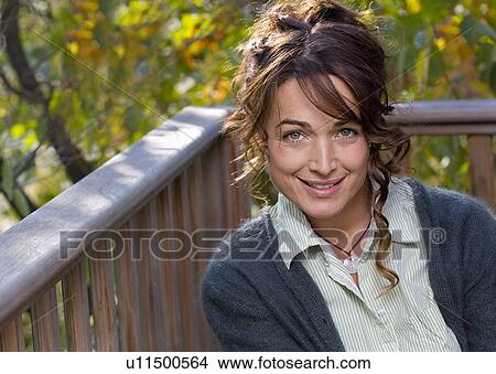 Portrait of woman outside. View Large Photo Image Picture - Portrait of woman outside.. Fotosearch