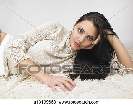 Woman Laying On The Floor Smiling Stock Image U Fotosearch