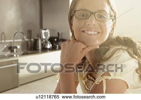 Young business woman portrait in kitchen. View Large Photo Image Stock Photography - Young business woman portrait in kitchen.. Fotosearch