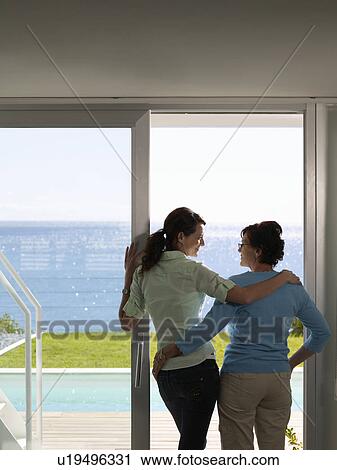 Mother and daughter hugging View Large Photo Image Stock Image - Mother and daughter hugging. Fotosearch