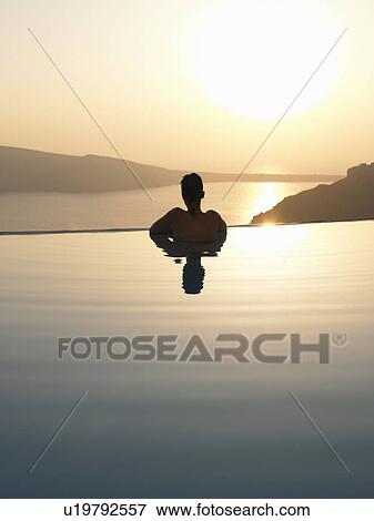 Woman in swimming pool View Large Photo Image Stock Photo - Woman in swimming pool. Fotosearch