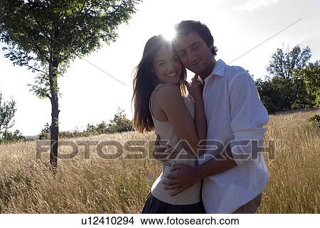 Couple hugging each other View Large Photo Image Picture - Couple hugging each other. Fotosearch