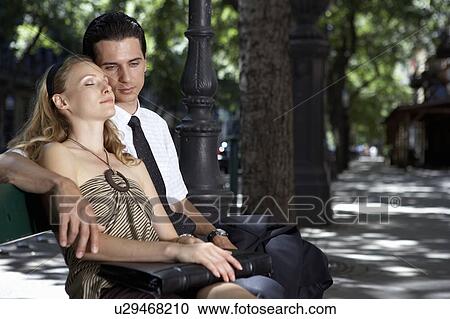 Couple outdoors embracing. View Large Photo Image Stock Image - Couple outdoors embracing.. Fotosearch