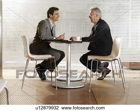 Businessmen in a restaurant. View Large Photo Image Stock Image - Businessmen in a restaurant.. Fotosearch
